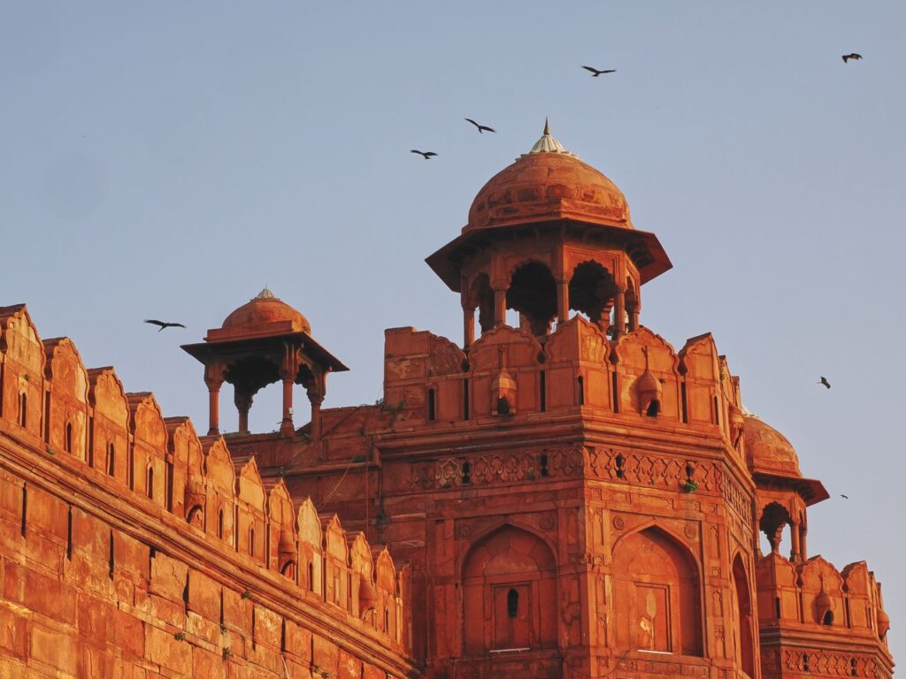 Delhi tour packages India gateway city travel India Gate Delhi night view tourism Red Fort Delhi historical monument tour Qutub Minar UNESCO heritage site Delhi Lotus Temple Delhi architecture travel spot Delhi sightseeing tour package FlixHoly Delhi family holiday package India capital Old Delhi Chandni Chowk food tour Premium Delhi travel package cab sightseeing FlixHoly Delhi holiday packages booking