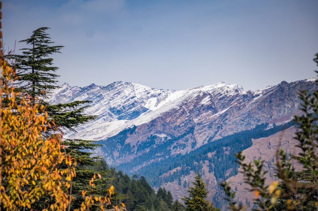 Delhi to Kashmir tour packages scenic mountain valley view Srinagar Dal Lake shikara ride Kashmir holiday package Gulmarg snow adventure skiing gondola ride Kashmir Pahalgam river valley lush green landscapes Kashmir tour Kashmir honeymoon package couple romantic snow trip Family Kashmir tour package from Delhi FlixHoly travel Mughal gardens Srinagar Nishat Bagh Shalimar Bagh Kashmir winter snowfall tourism India travel package Premium Kashmir holiday package hotels and cab service FlixHoly Delhi to Kashmir tour booking India